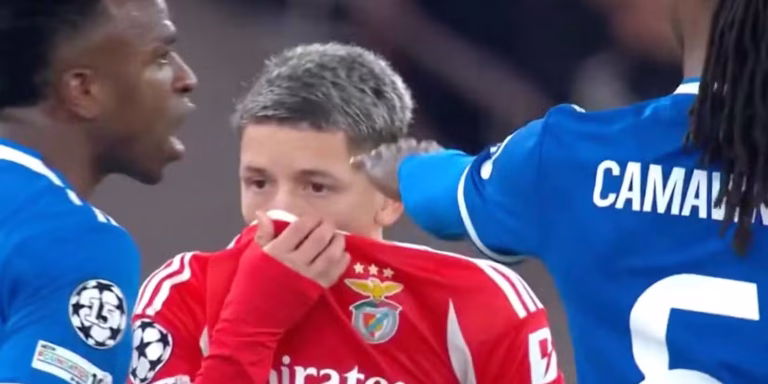 Gianluca Prestianni covers his face